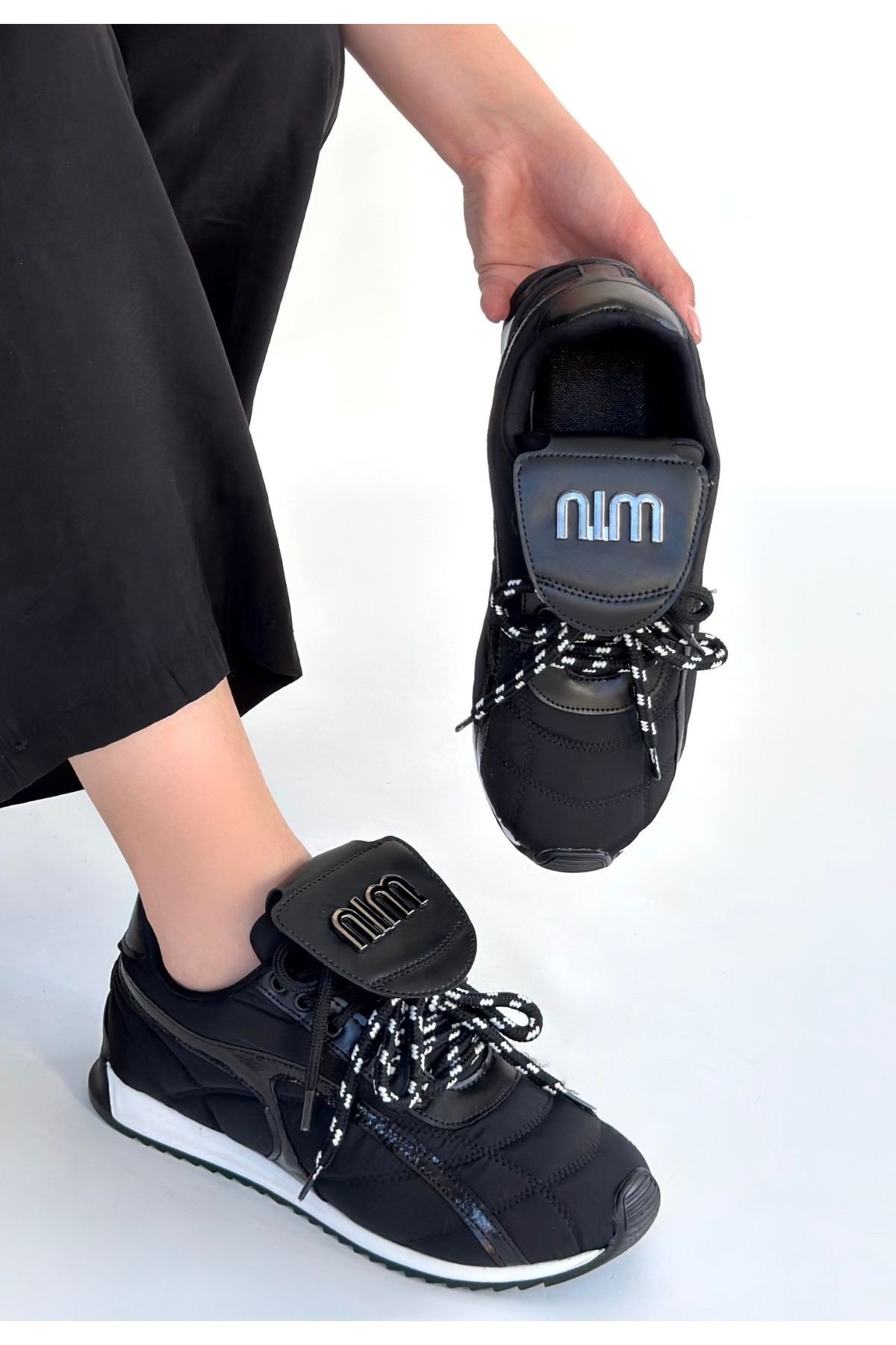 Kadın Sneaker Siyah Cilt Bağcıklı Günlük Spor Ayakkabı Paraşüt Detaylı Kadın Sneaker Siyah Cilt Bağcıklı Günlük Spor Ayakkabı Paraşüt Detaylı